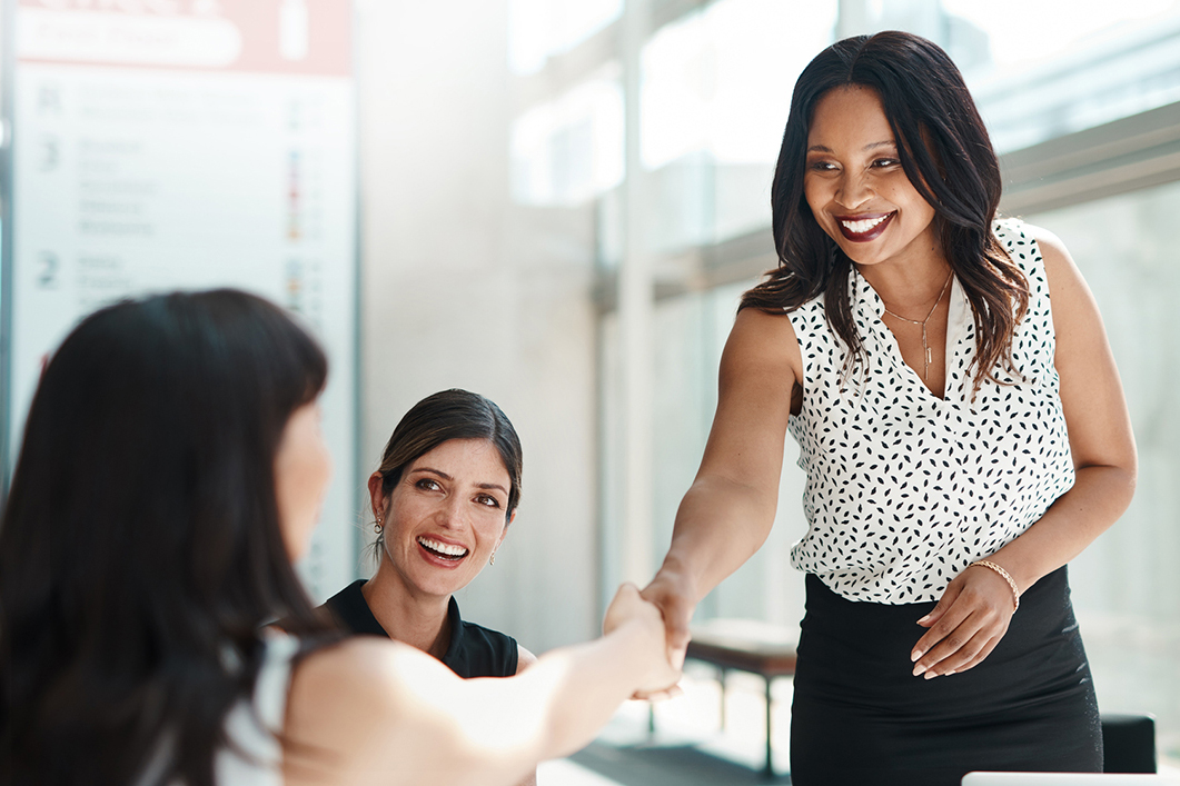 Women shaking hands